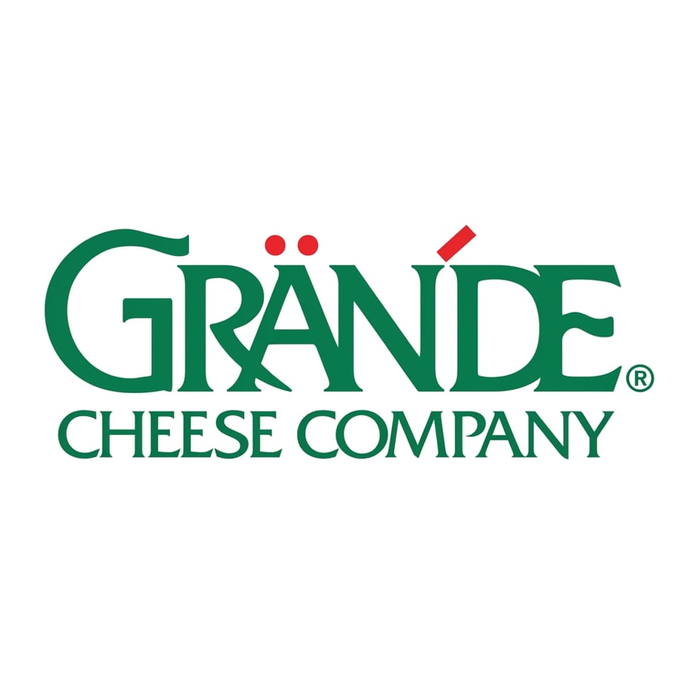 The Grande Cheese Company logo, featuring green text with red accents on a white background.