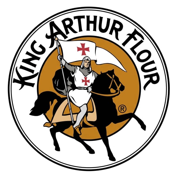 King Arthur Flour logo with a knight on horseback holding a flag with a red cross.